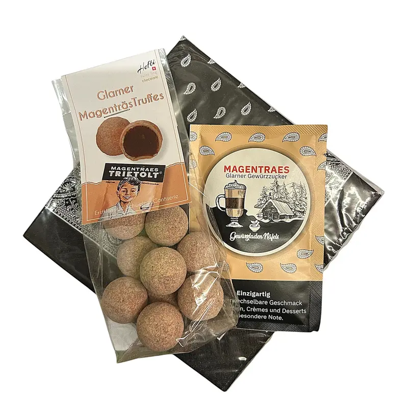 Geschenk schwarze Serviette mit Magenträs