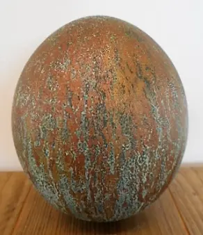 Strausseinei Patina gold