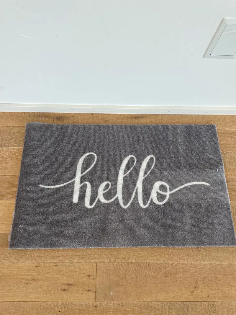 Türvorlage grau Hello waschbar